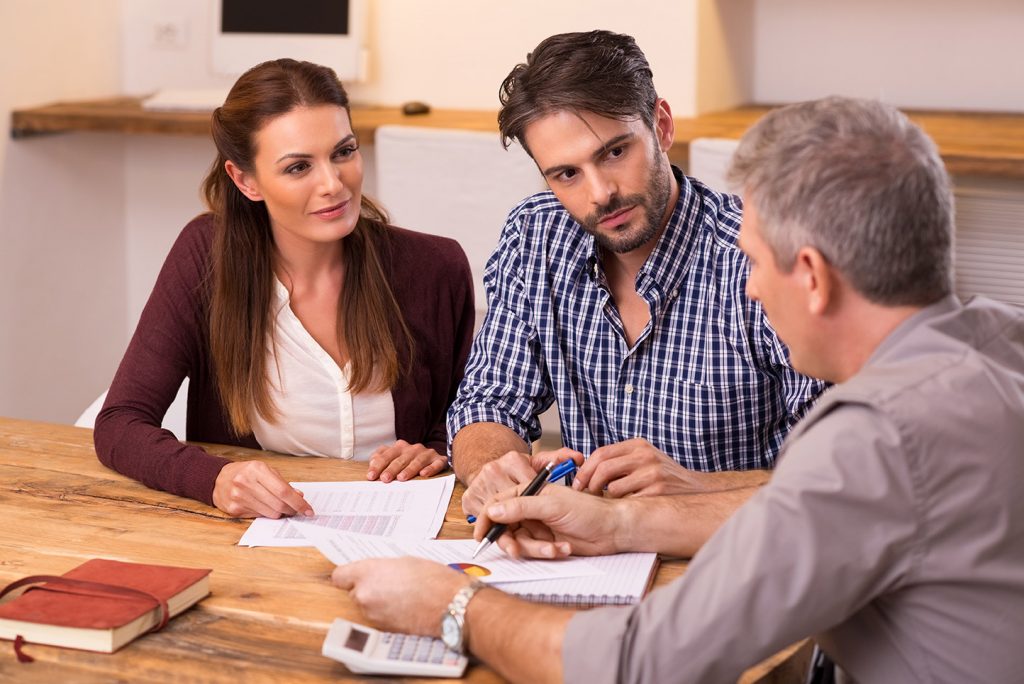 Couple Working with an Attorney