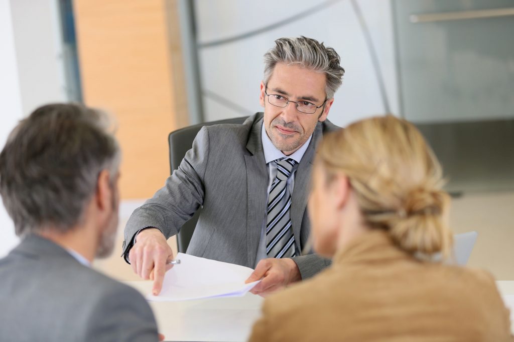 Couple Working with Attorney